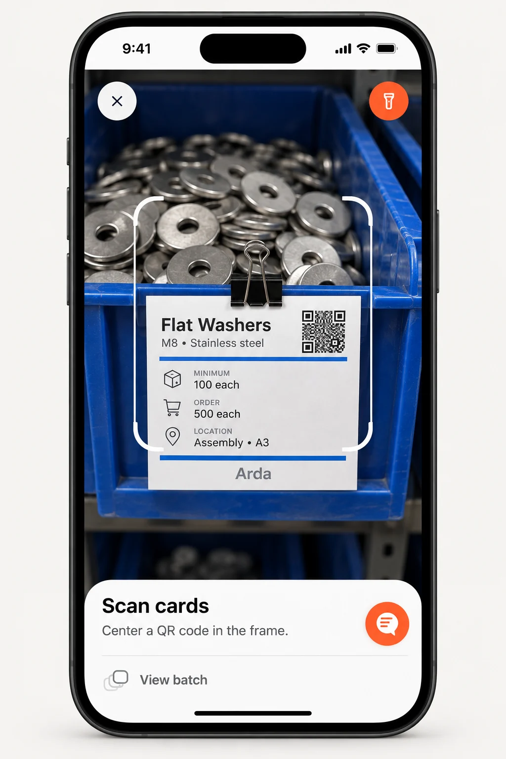 Arda mobile camera scanning a Kanban card beside a bin of washers.